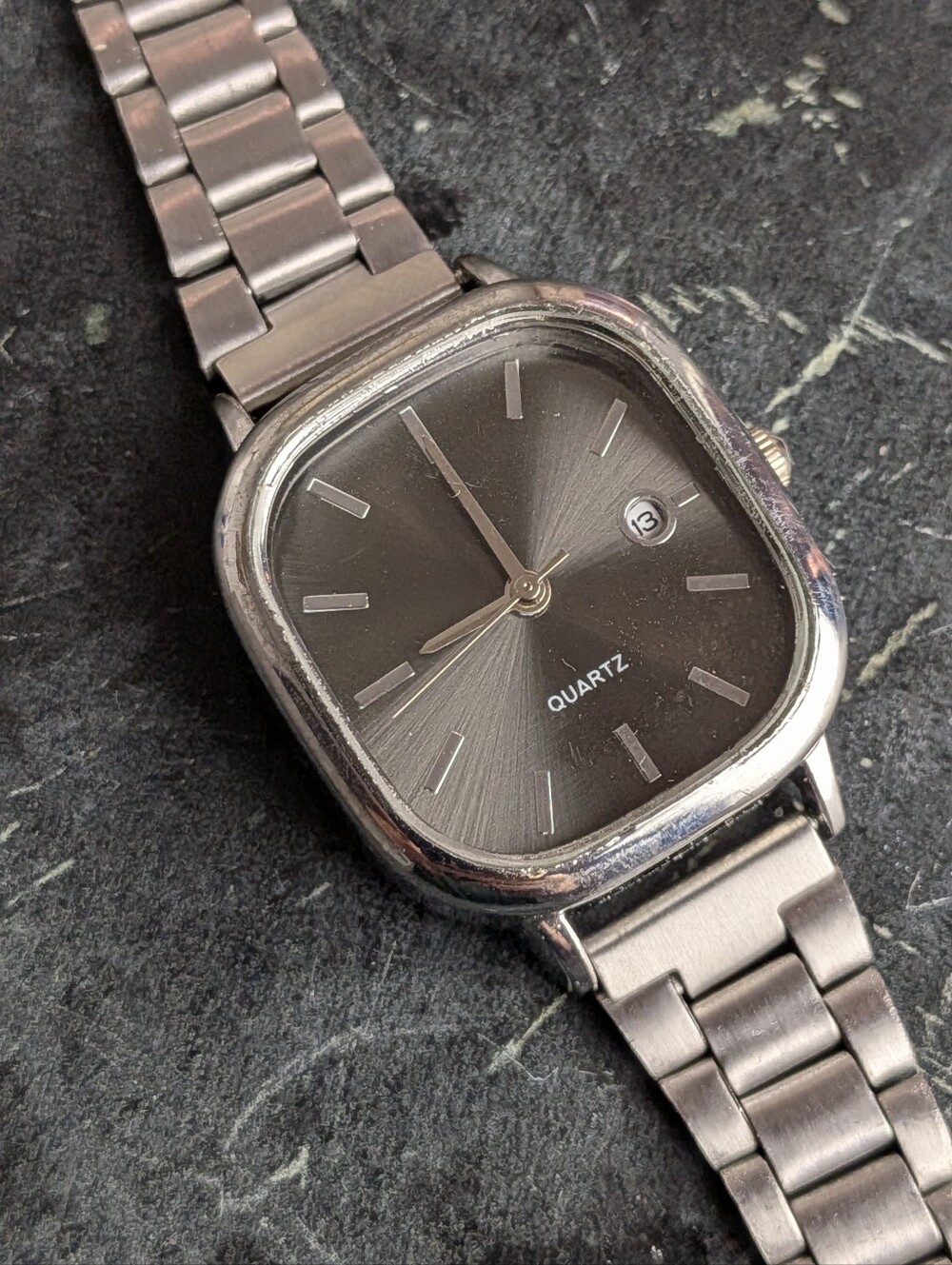 Vintage Silver Men’s Watch with Black Sunburst Dial